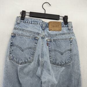 Vintage Levis Jeans Women's 26x31 Blue 521 Relaxed Tapered Light Wash 90s Faded